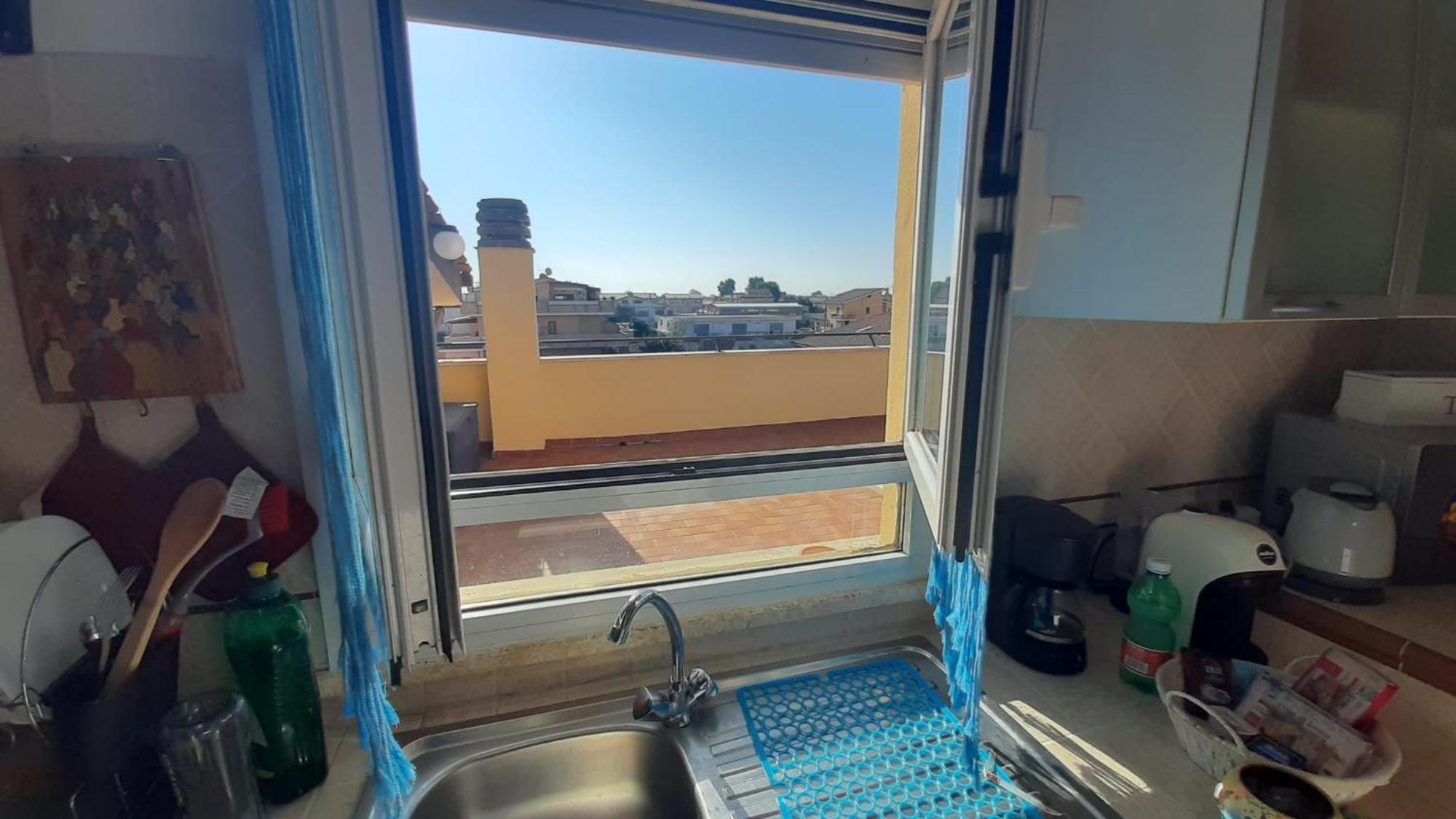 Appartement La Terrazza Sul Faro à Fiumicino Extérieur photo